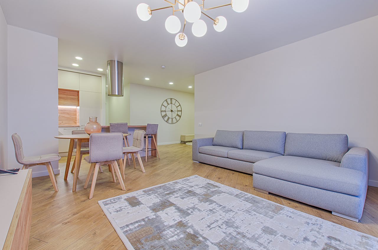 Crafting Captivating Headlines: Your awesome post title goes here Spacious contemporary living room featuring stylish furniture and elegant lighting.